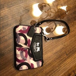 Small coach clutch. Purple pattern